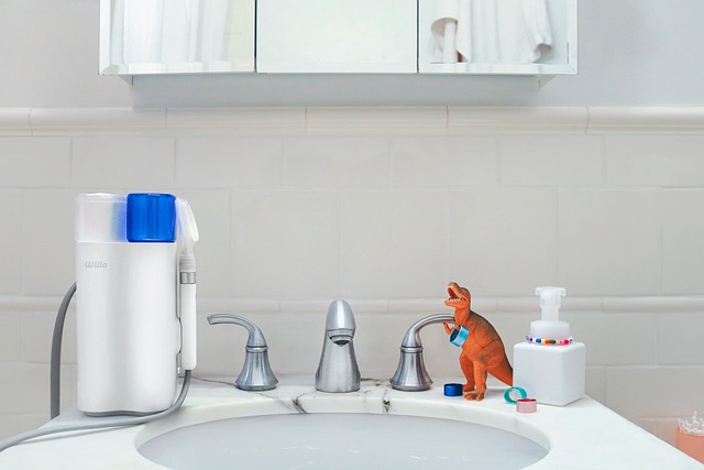 Sink with stainless steel faucet and knobs